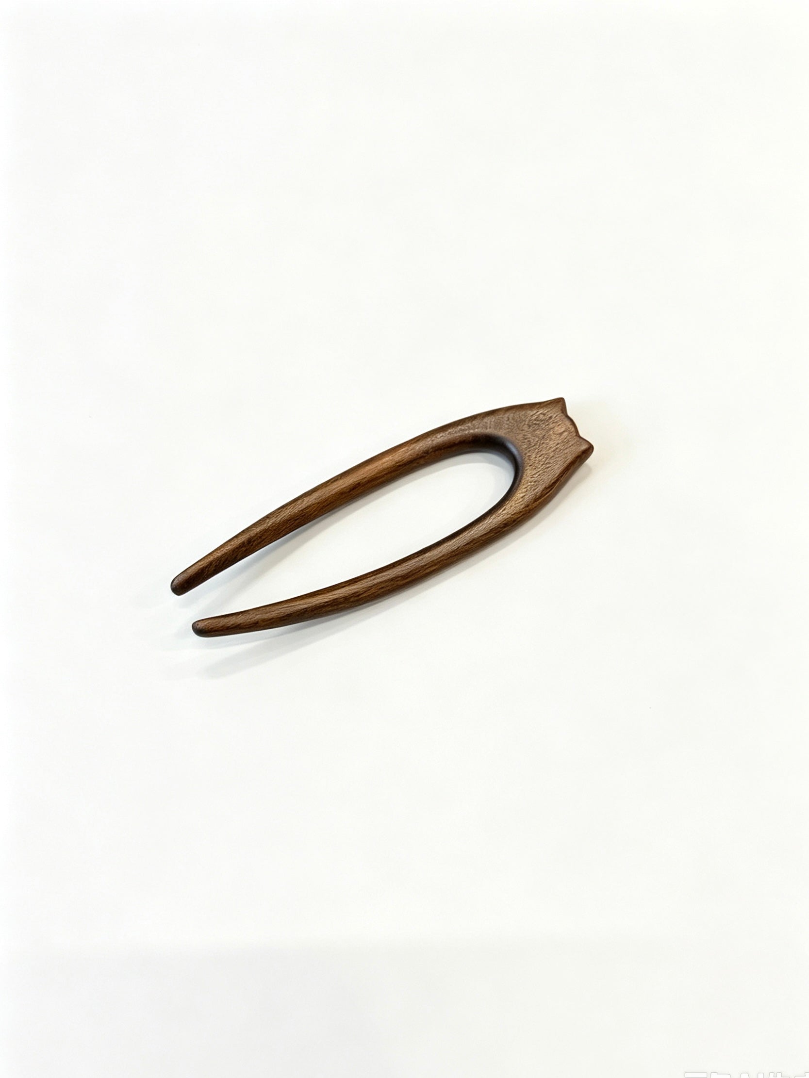 Cat double-prong sandalwood hair fork displayed on a white background