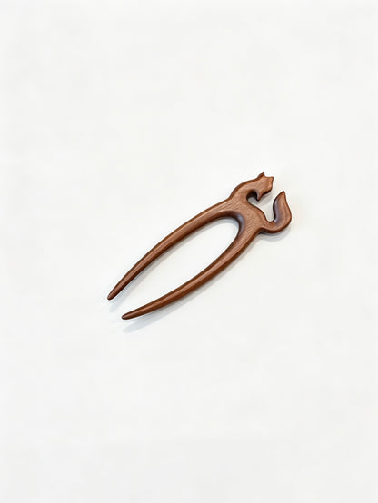 Fox double-prong hair fork displayed on a white background